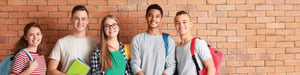 Group of happy teens at school