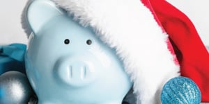 blue piggy bank with santa hat