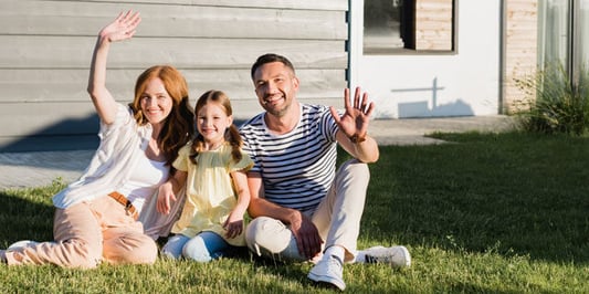 family-in-front-of-new-home-1