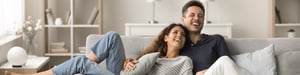 couple laughing at home