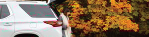 happy-person-with-auto-in-autumn