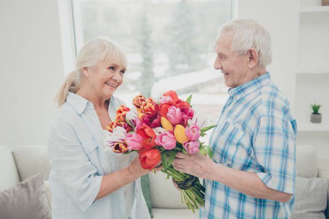 older couple with tulips