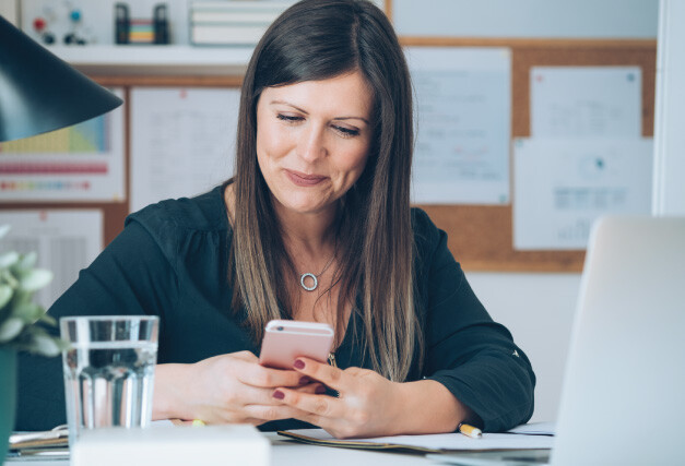 person-at-home-using-phone