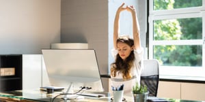 a person stretching in the sunlight