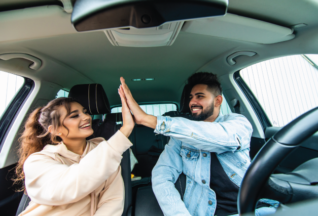 summer-auto-couple-high-five
