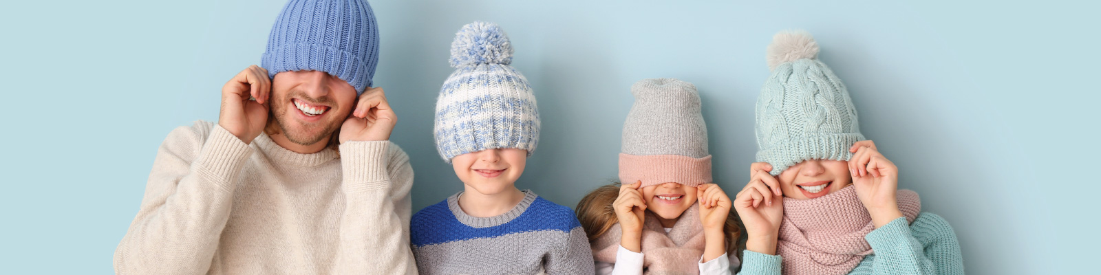 winter-family-with-warm-winter-clothes-being-silly winter-family-with-warm-winter-clothes-being-silly