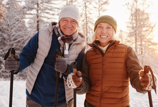 winter-older-couple-cross-country-skiing