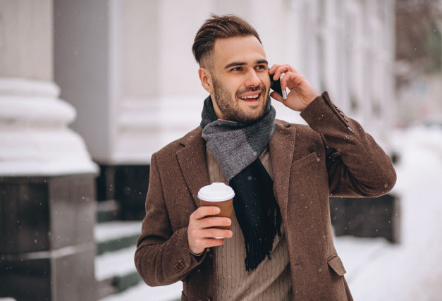winter-person-on-phone-on-snowy-day