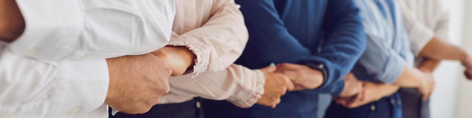 community-holding-hands