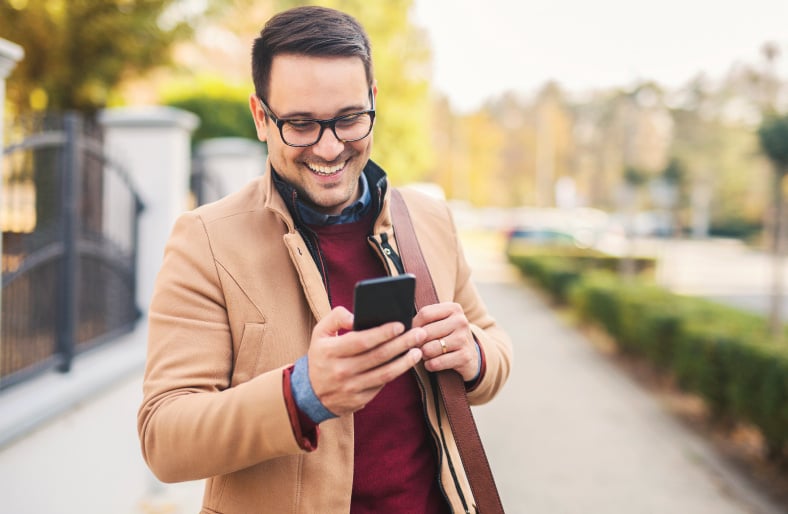 fall-happy-person-checking-phone