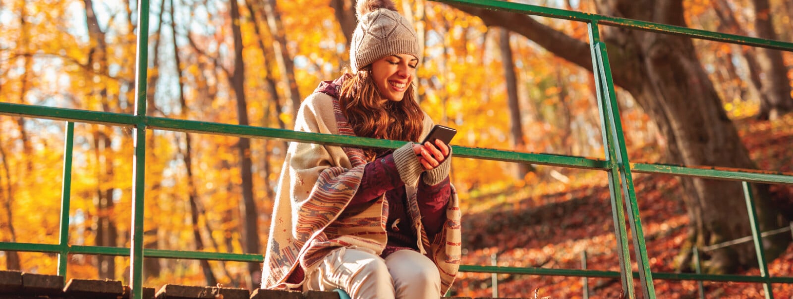 fall-hiking-happy-on-phone