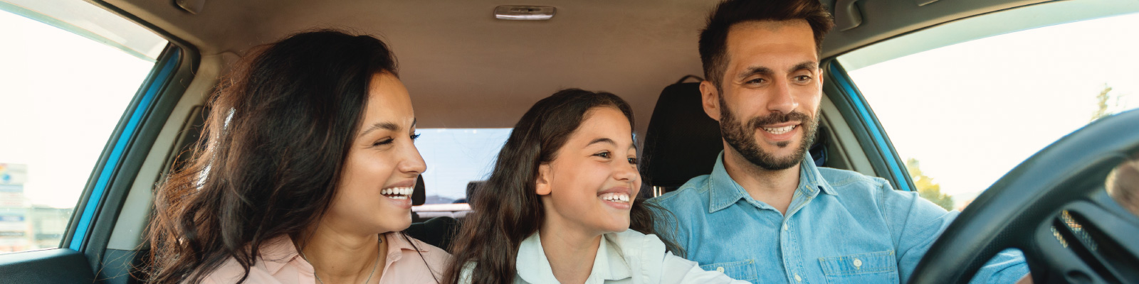 family-checking-out-a-new-car