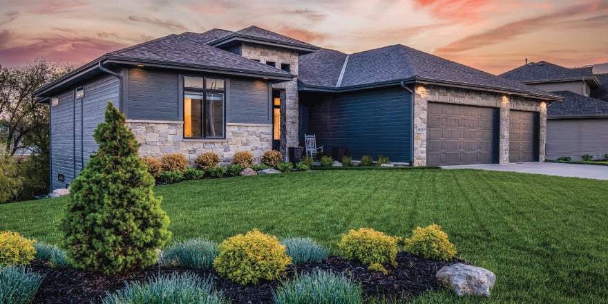 house and yard at sunset