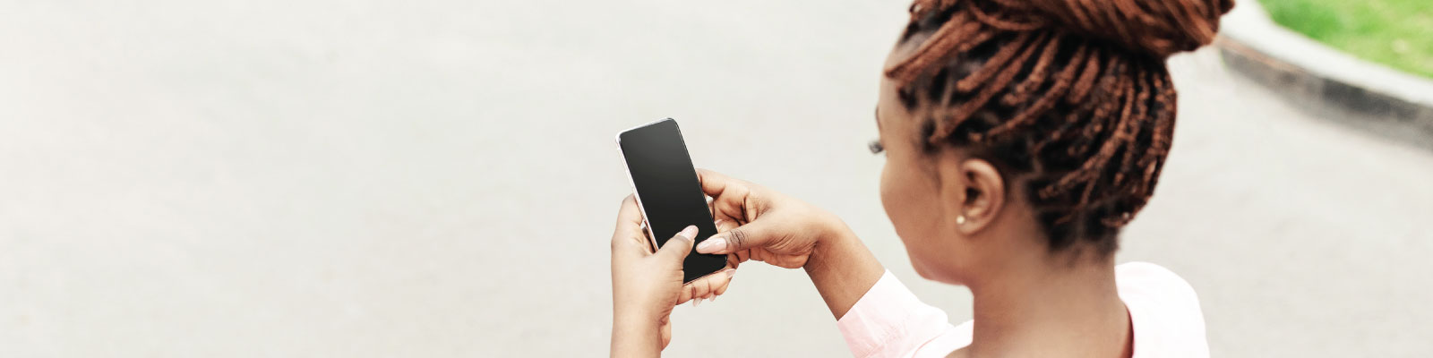 person-in-wheelchair-using-phone-in-spring