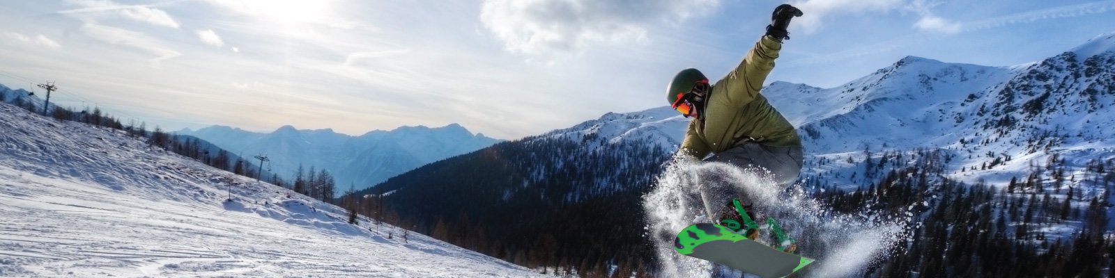 winter-jumping-on-a-snowboard