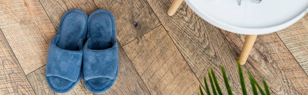 slippers on wood floor at home
